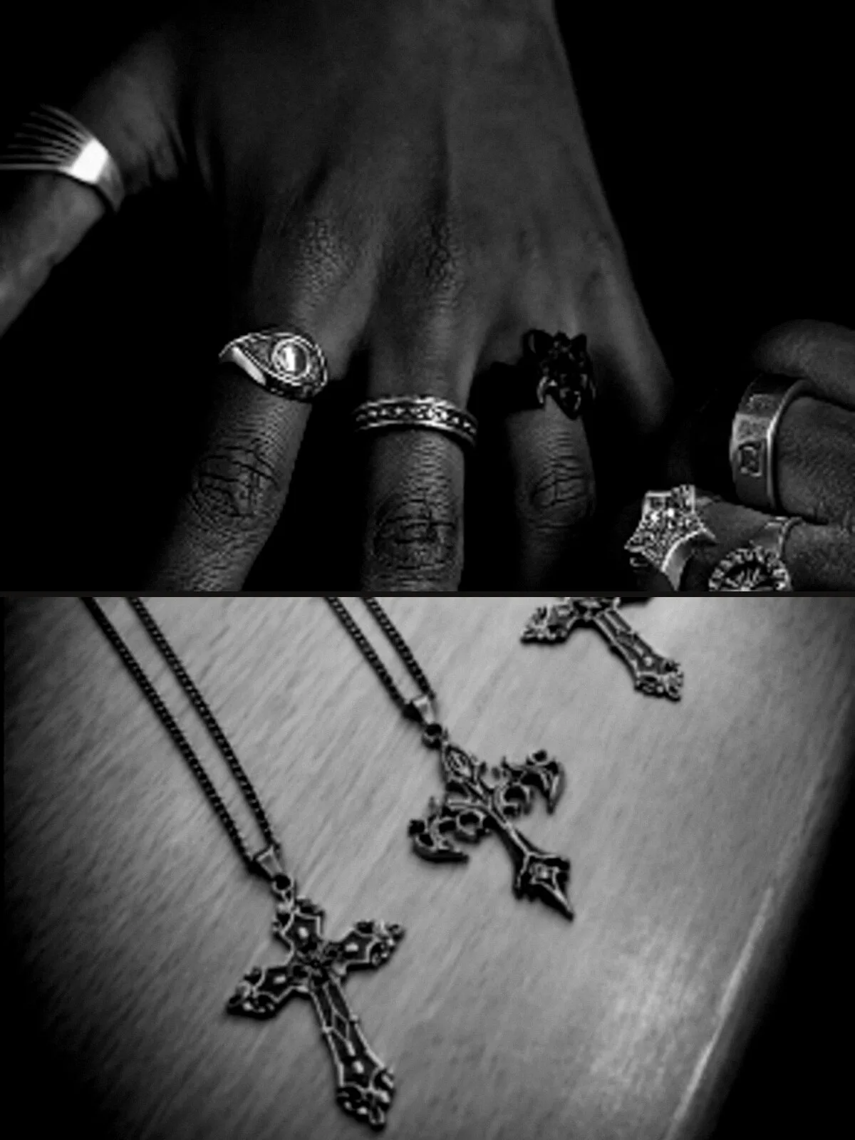 Stacked silver rings and gothic cross pendant chains laid out in the studio